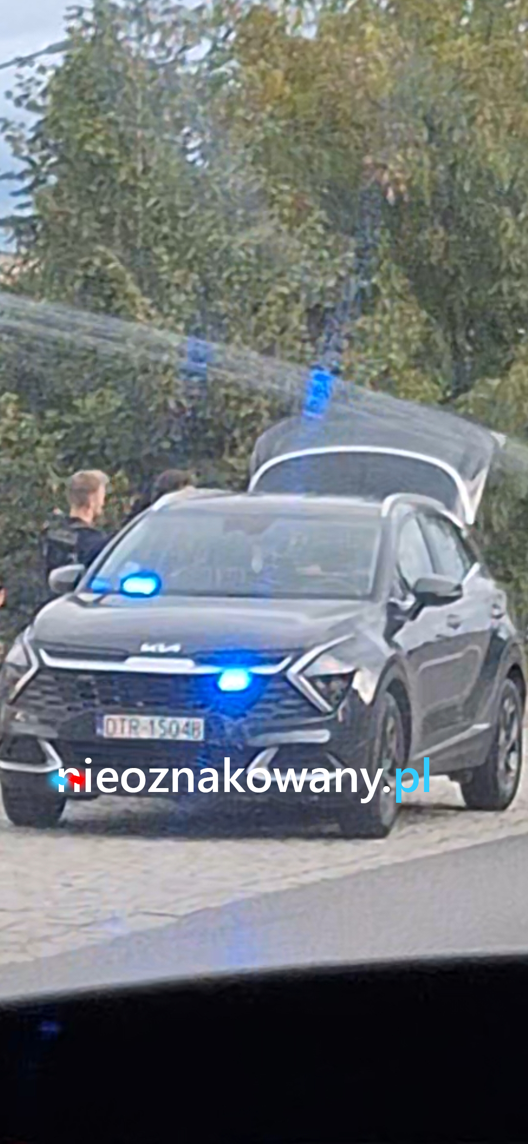 Nieoznakowany radiowóz Kia Sportage
